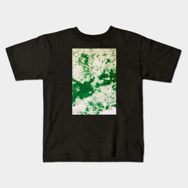 Green felt disbursed on a white surface Kids T-Shirt by textural